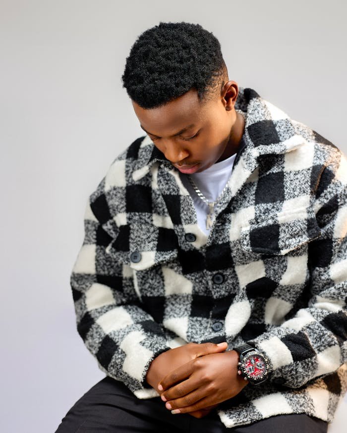 Contact stylish-young-man-in-black-and-white-checkered-jacket-35636335